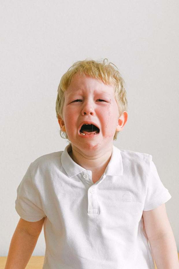 Child frustrated at not being able to communicate what they need